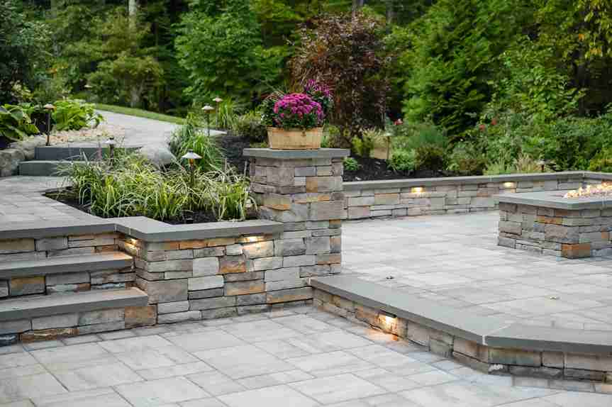 Beautiful multi-level patio using stone and premium pavers
