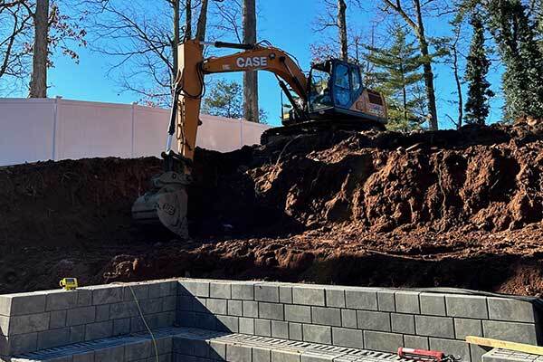 Excavation work in progress by Landscape Solutions in NJ